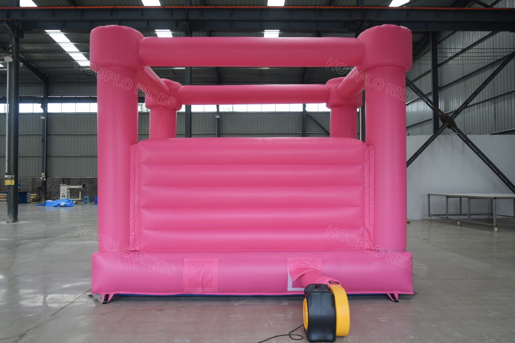 Pink Wedding Bounce House, plain solid pink inflatable wedding bouncy castle factory photo - rear back view equipped with air blower