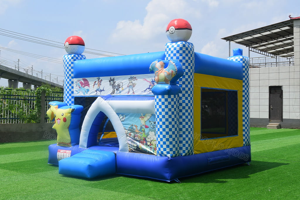 Right side view of kids Pokemon inflatable bounce house, Charizard 3D decoration, pokeball top pillars, big yellow mesh safety window, backyard party inflatable jumper