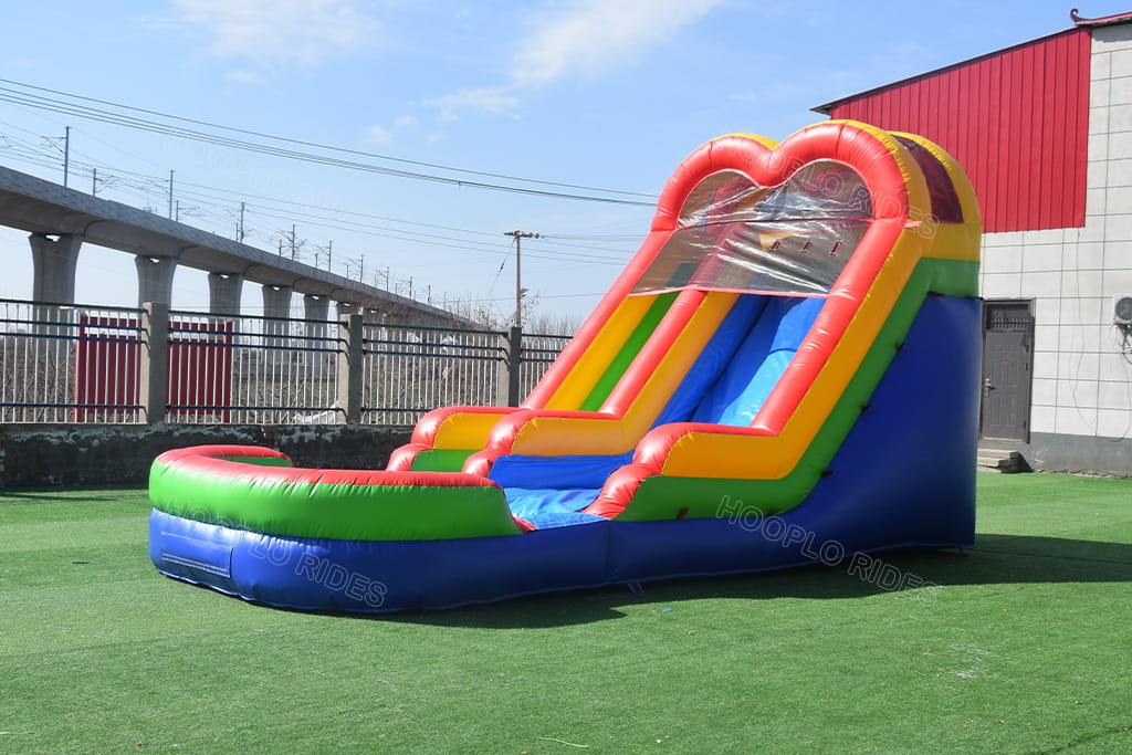Full Side Profile View Rainbow Heart Inflatable Water Slide, Heart Arch Design Outdoor Kids Summer Inflatable Water Play Slide With Splash Landing Pool