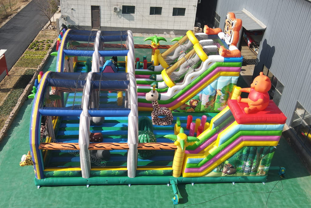 Rear top view Hooplo Forest Animal Inflatable Bounce House, dual slide animal themed inflatable bounce castle with integrated obstacle play area for kids outdoor entertainment