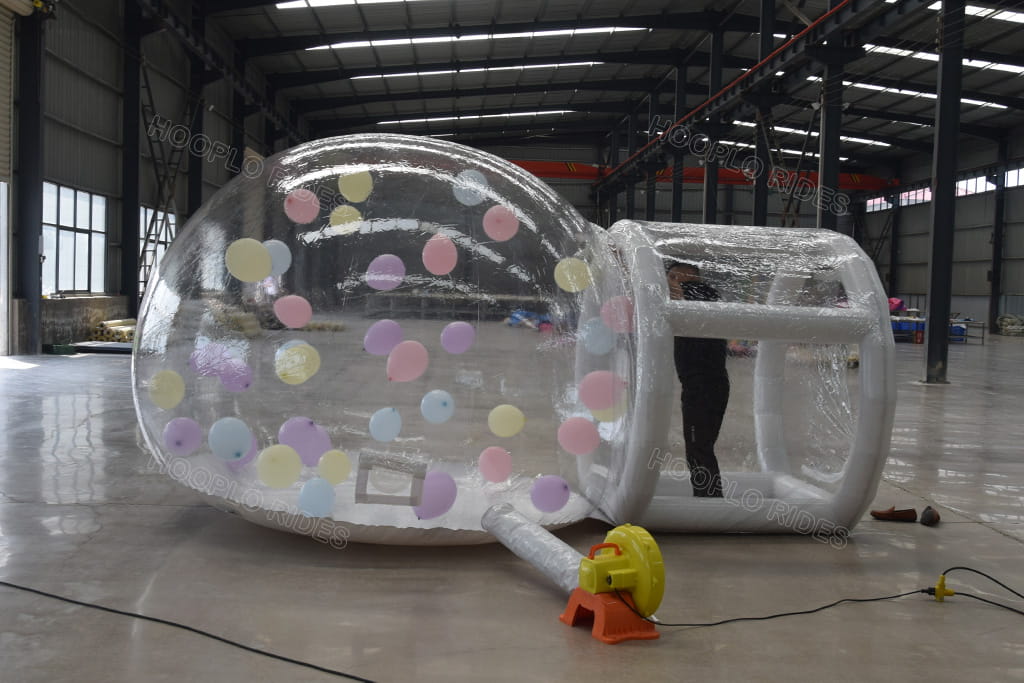 Hooplo Transparent Inflatable Bubble House Front Tunnel View, Clear PVC Party Bubble Dome With Pastel Balloons Inside & Matching Electric Air Blower