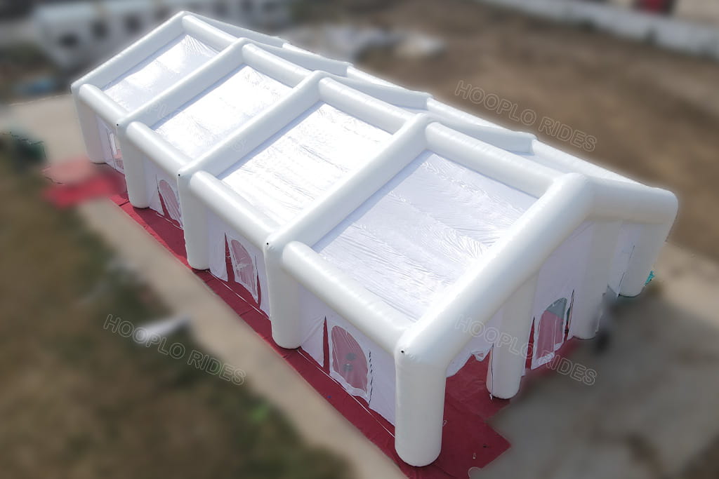 Full side aerial view of 24*12m oversized white inflatable shelter, durable waterproof PVC inflatable tent for exhibition, banquet and commercial rental business