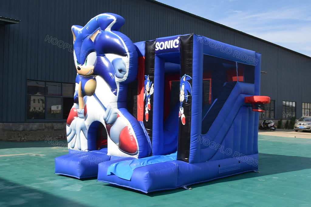 Right side view sonic inflatable bounce house combo with slide and built-in basketball hoop, commercial PVC kids jumper for party rental
