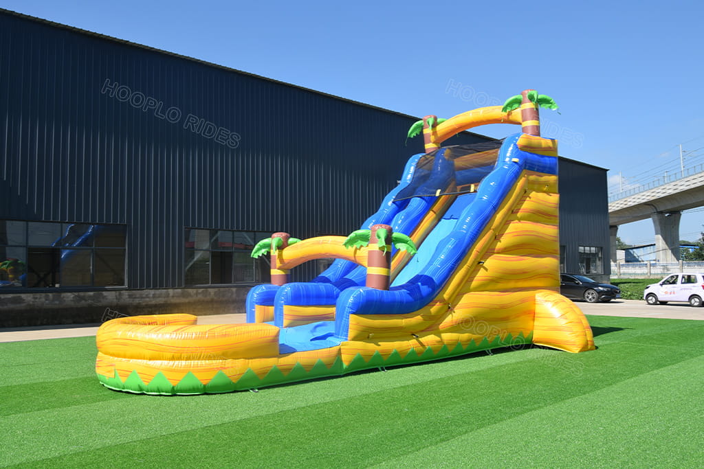 Side angle tropical jungle inflatable water slide, yellow rock texture inflatable waterslide for party rental
