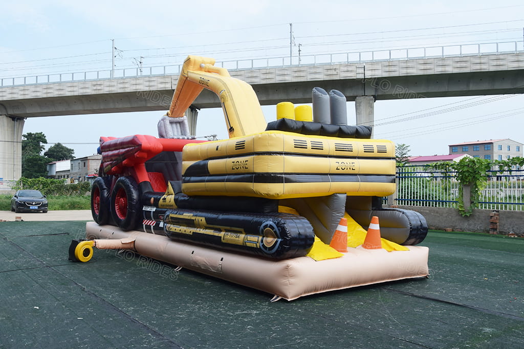 Engineering vehicle inflatable bouncy castle back view with air blower, heavy‑equipment theme commercial kids inflatable playground