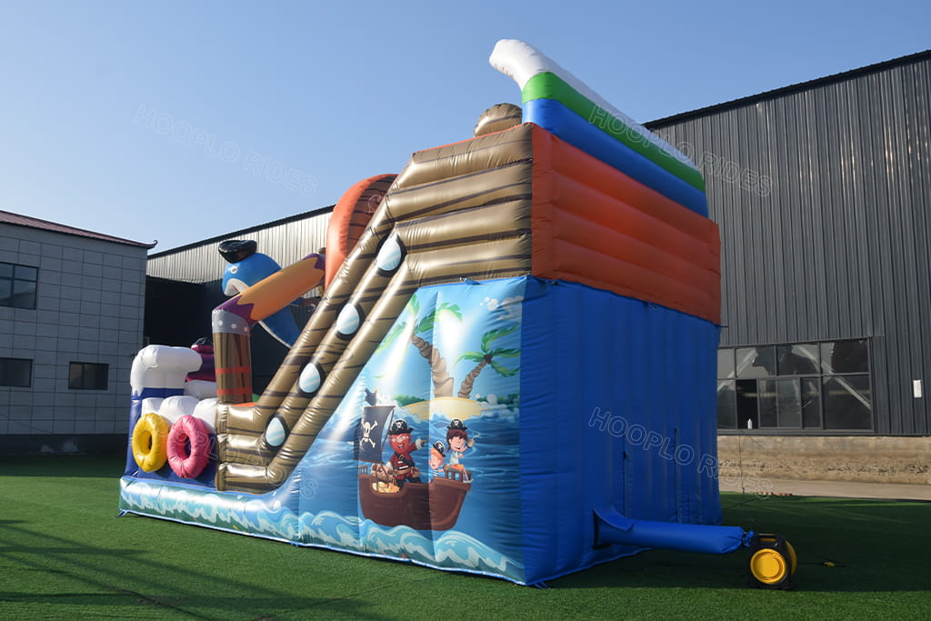 Rear side view pirate ship inflatable dry slide, equipped with air blower, pirate pattern printing on side wall
