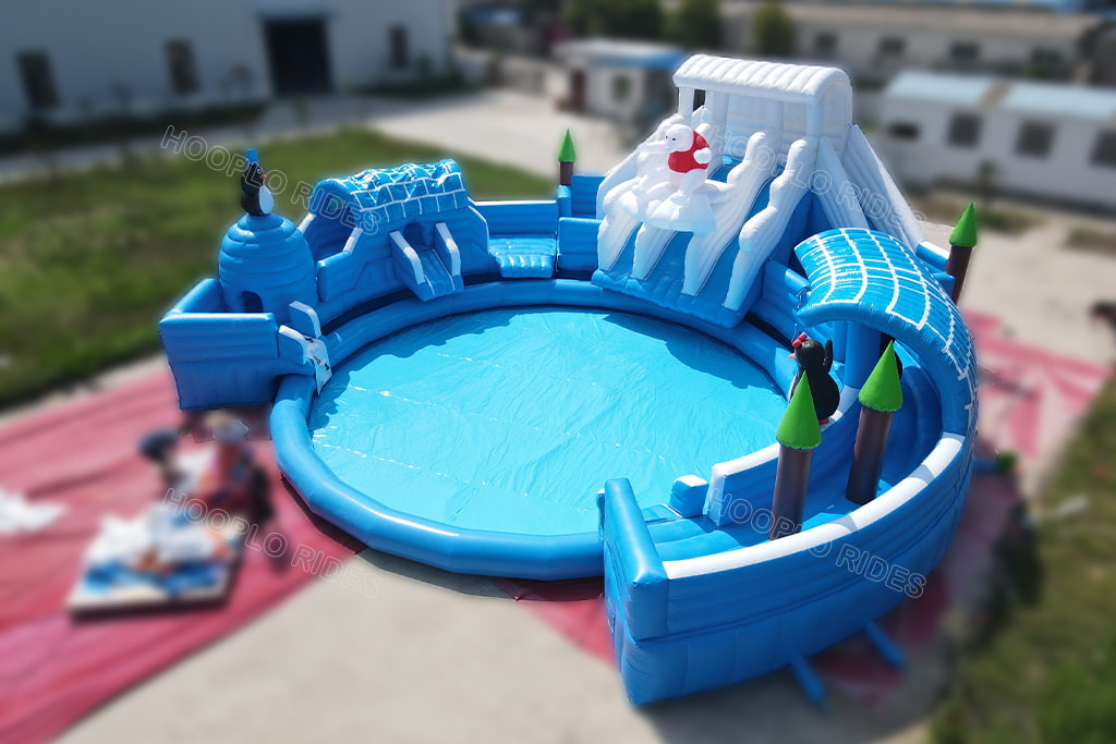 Outdoor inflatable arctic water park, inflatable igloo and penguin decorations, large circular water pool