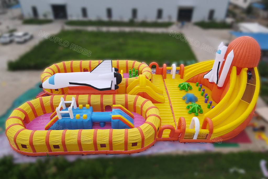 Full panoramic view of large space rocket inflatable playground with multi obstacle zones for rental business